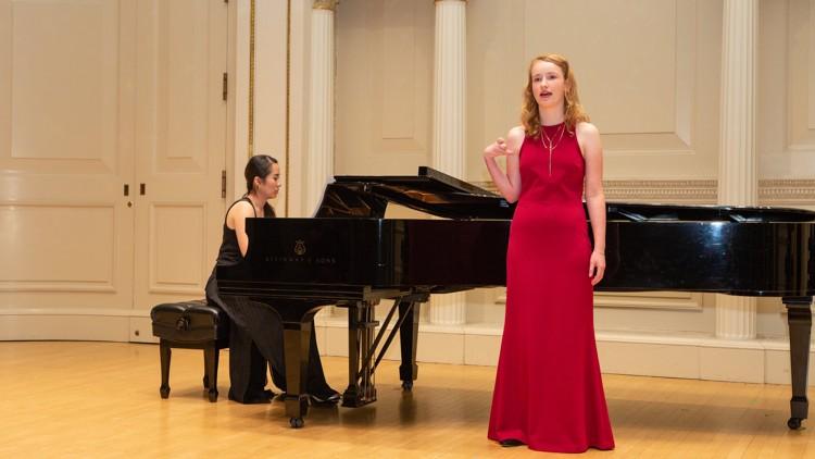 Student and pianist performing music at Carnegie Hall