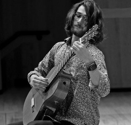 Jeremy Waldrip playing guitar, black and white