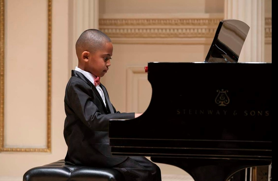 Student playing piano at Carnegie Hall